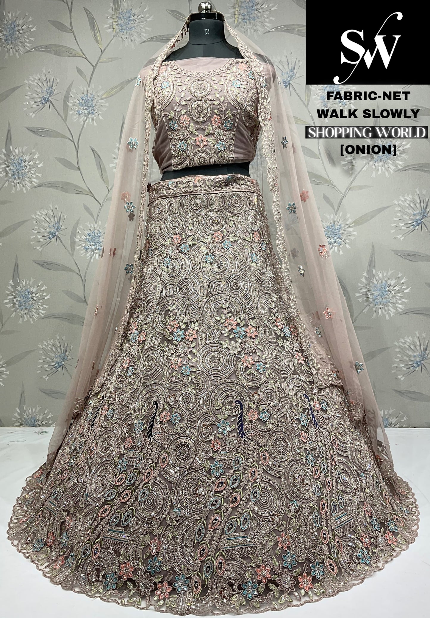 Lavishing Lavender Peacock Net Lehenga