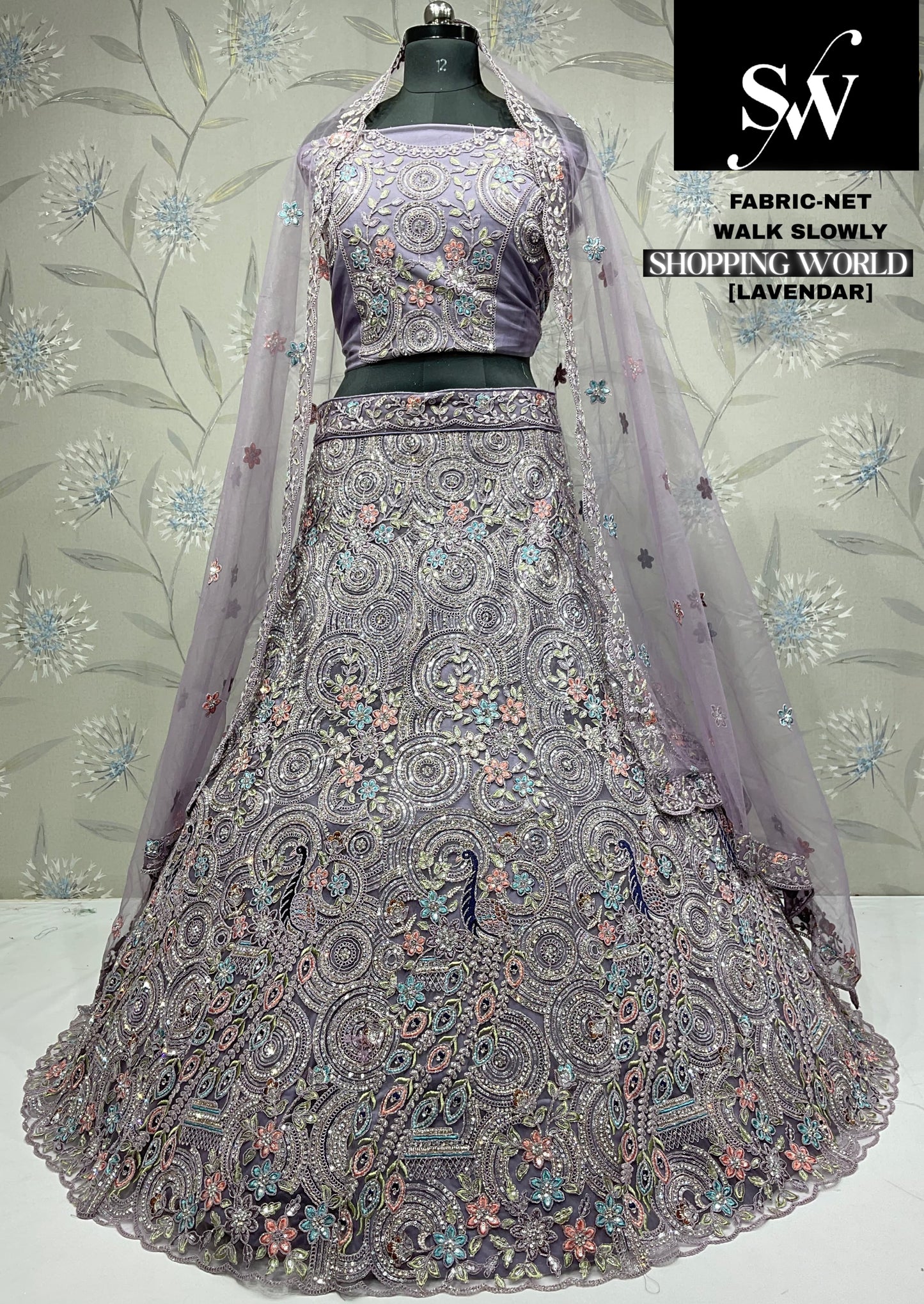 Pleasing White Peacock Net Lehenga