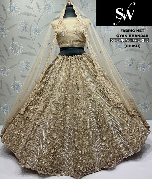 Charming chiku golden Net Lehenga