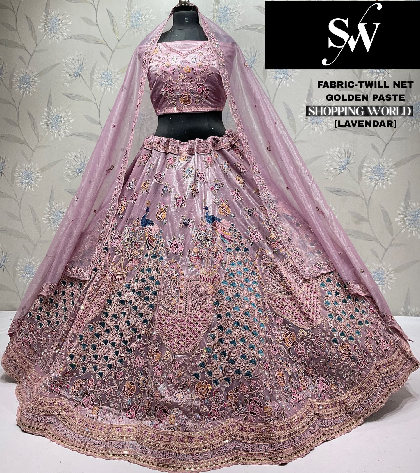 Attractive Chiku Golden peacock Twill Net Lehenga