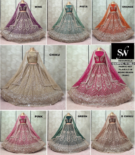 Khoobsurat wine Pista green Orange Chiku golden Rani pink Pink Green Dark chiku golden Net Lehenga