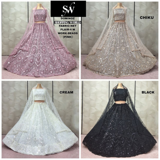 Tremendous pink Chiku golden White Cream Black net Lehenga