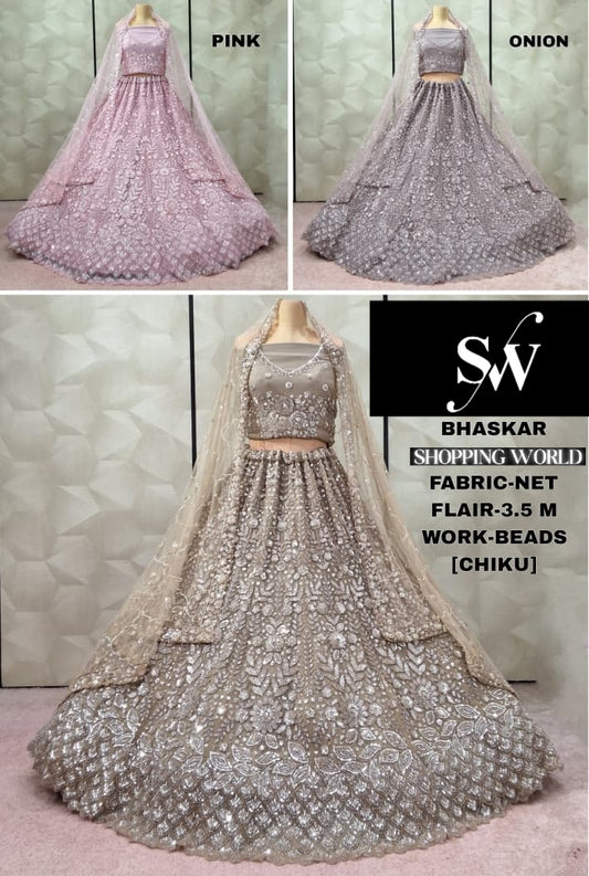 Fabulous Chiku golden Baby pink onion pink net Lehenga