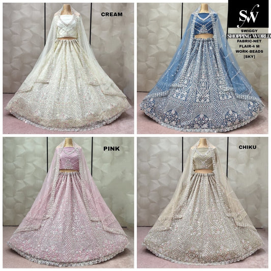Majestic Off white Cream Pink Chiku Sky blue net lehenga