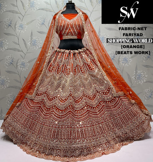 Embellished Orange Net crop top Lehenga