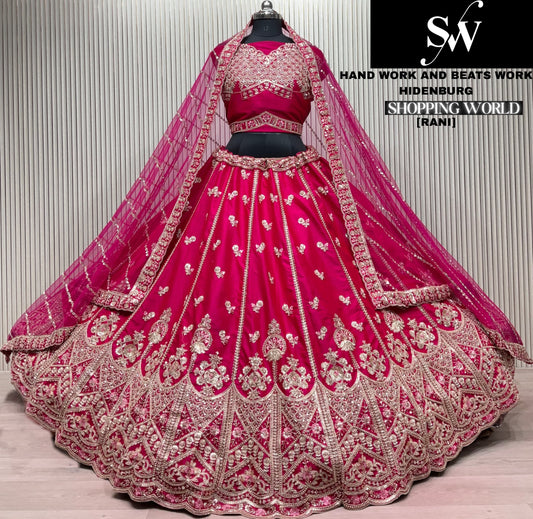 अलंकारित रानी गुलाबी रंग की हैंडवर्क बीट्स लेहंगा