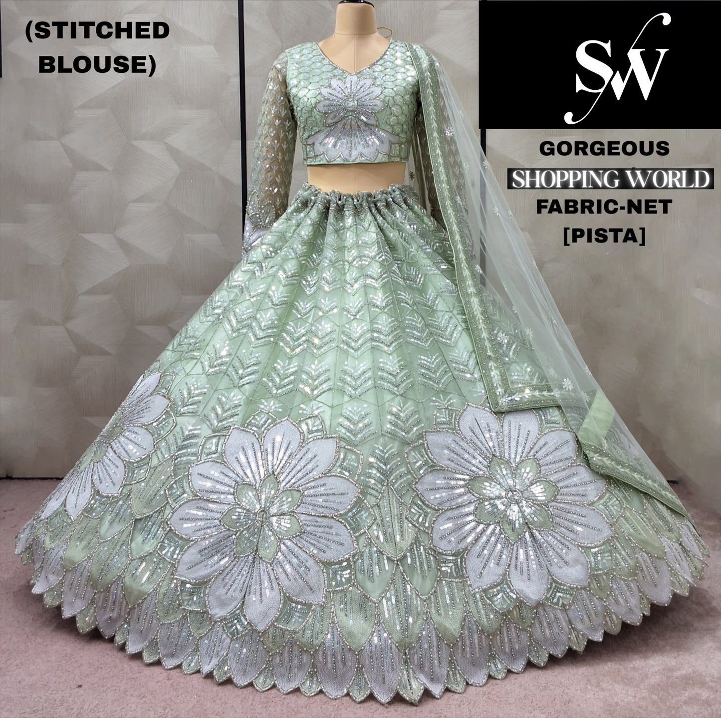 पिस्ता ग्रीन नेट क्रॉप टॉप लहंगा