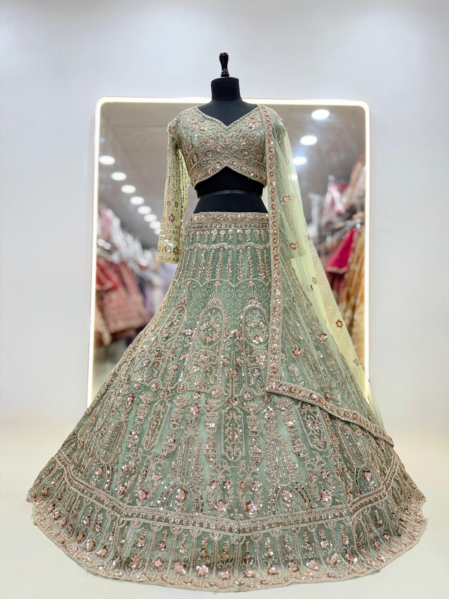 Pink net crop top lehenga