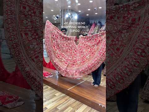 रानी गुलाबी मोर डिज़ाइनर ब्राइडल लहंगा
