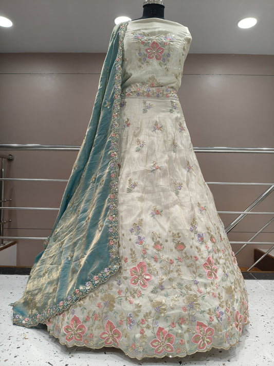 Lovely white sky blue cream lehenga