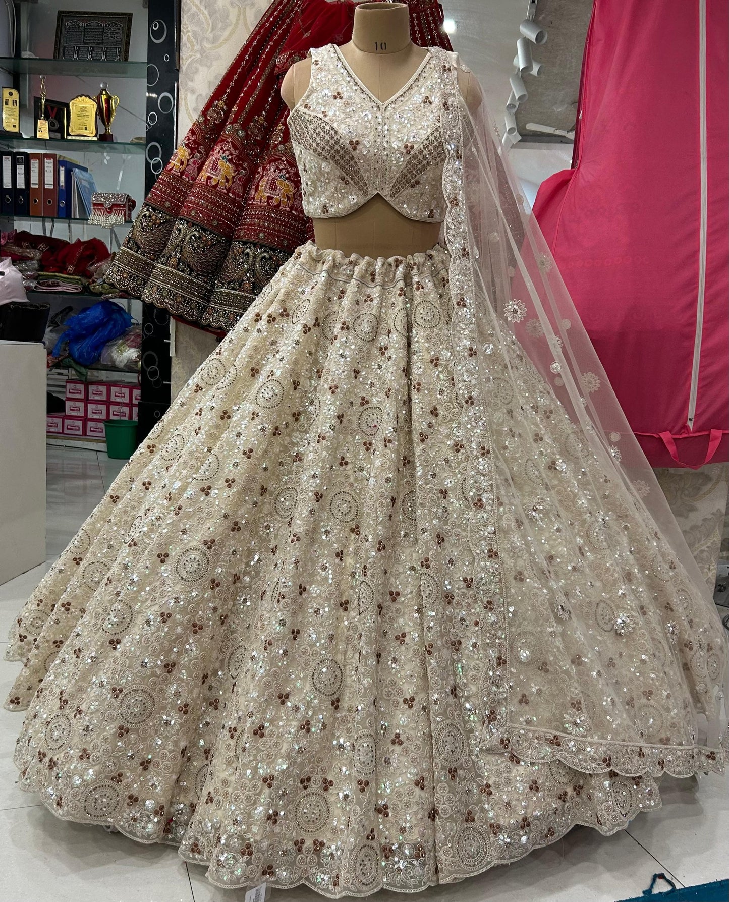 Eye catching off white golden Lehenga