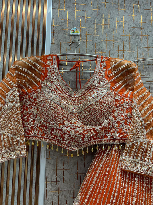 आकर्षक नारंगी क्रॉप टॉप लहंगा