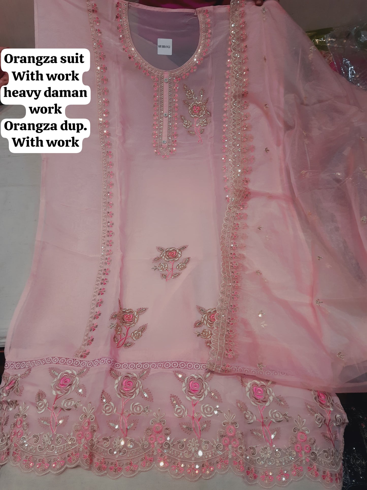 Pleasing baby pink organza unstitched Salwar suits dress material (free size)