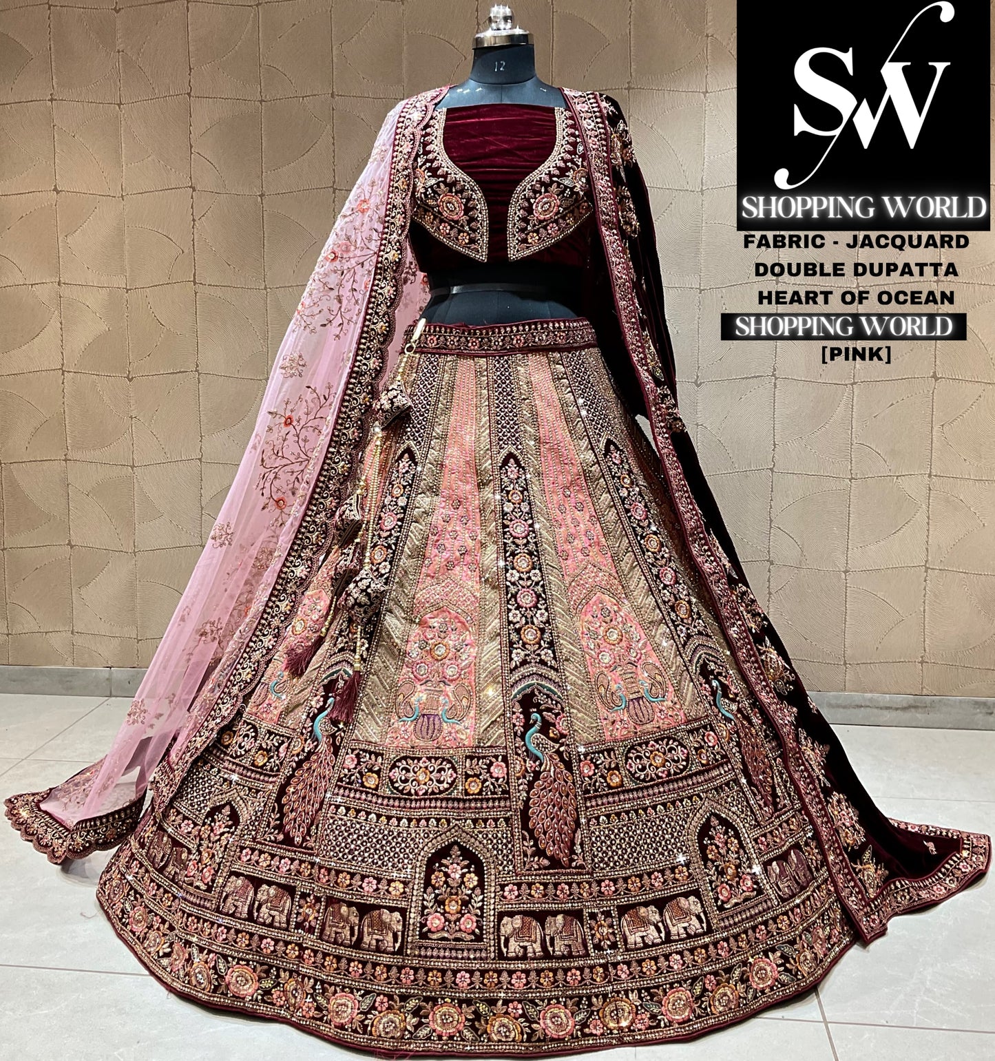 Fabulosa lehenga nupcial color rosa pavo real y granate