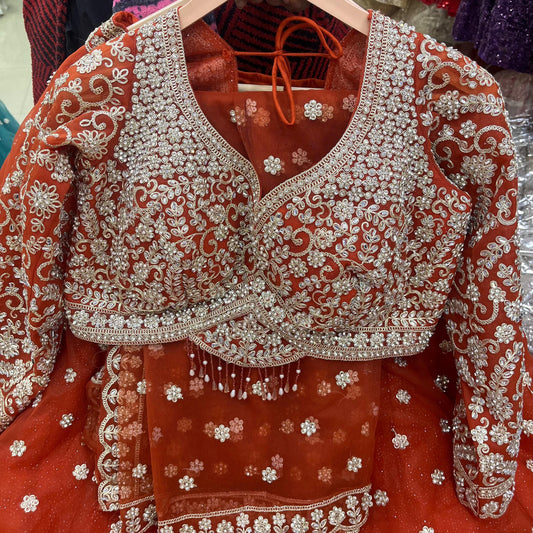 Engaging Rust Orange Booty Crop Top Lehenga