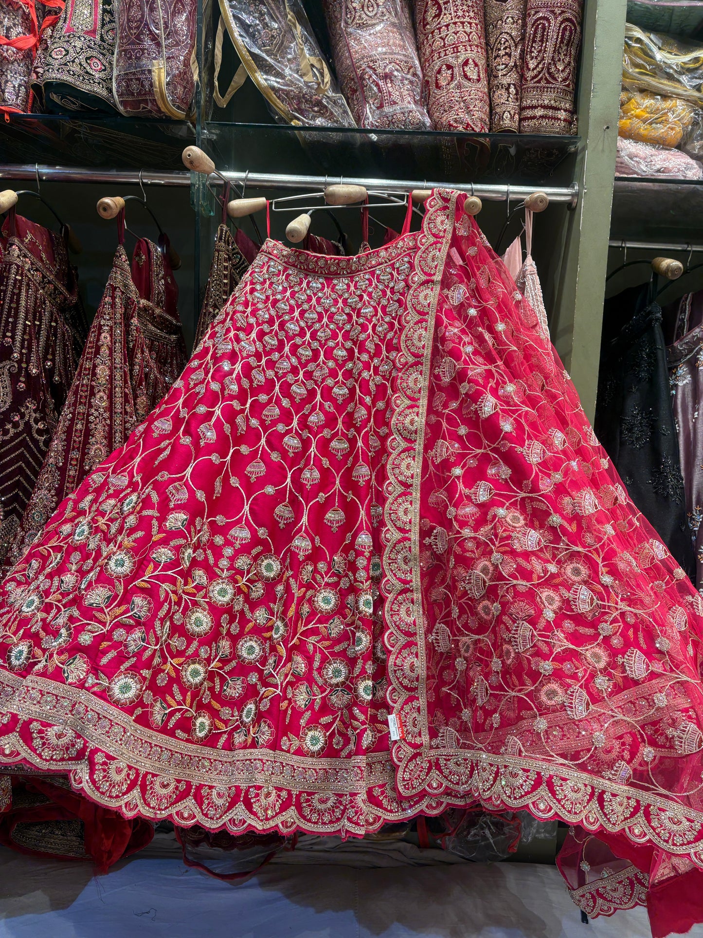 Good looking floral Rani pink Bridal Lehenga