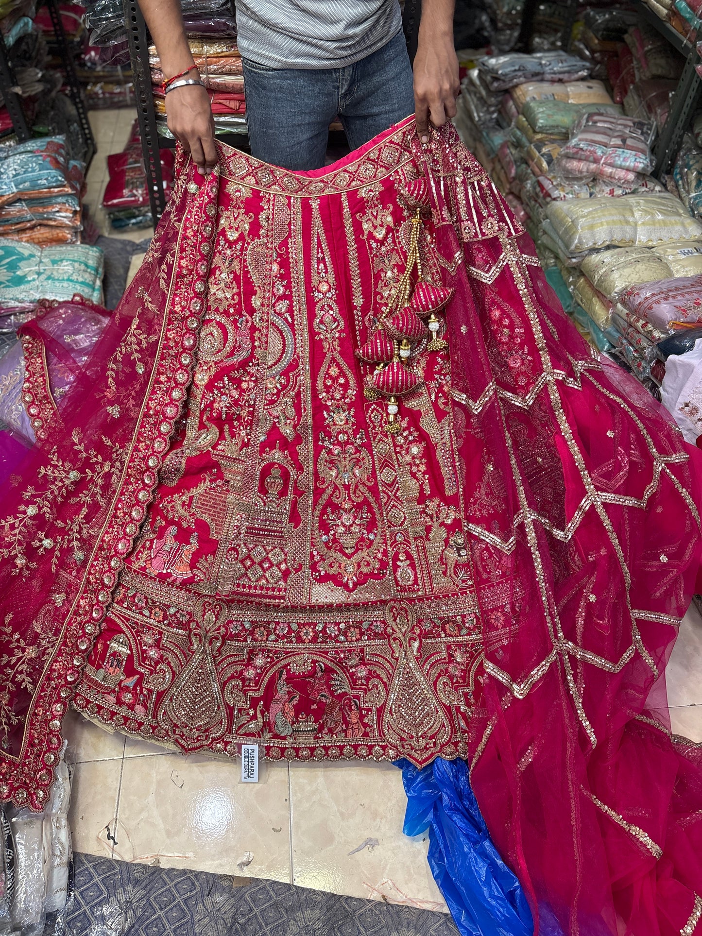 Tremendous Rani pink peacock Jaal Duptta Bridal Lehenga