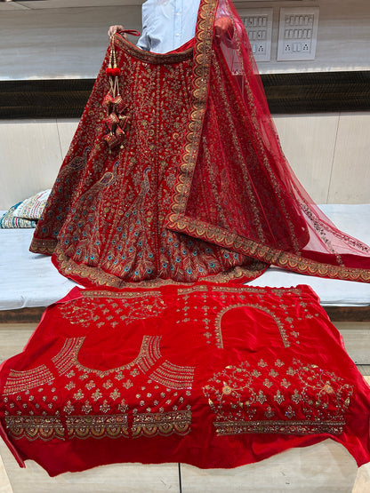 Stunning red Heavy peacock bridal lehenga
