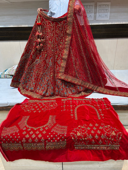 Stunning red Heavy peacock bridal lehenga