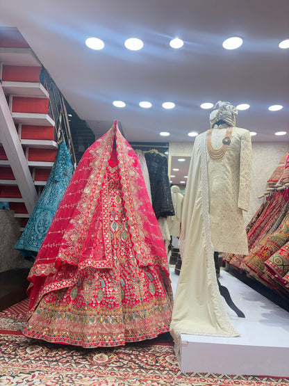 Pretty bridal peacock Lehenga sherwani combo