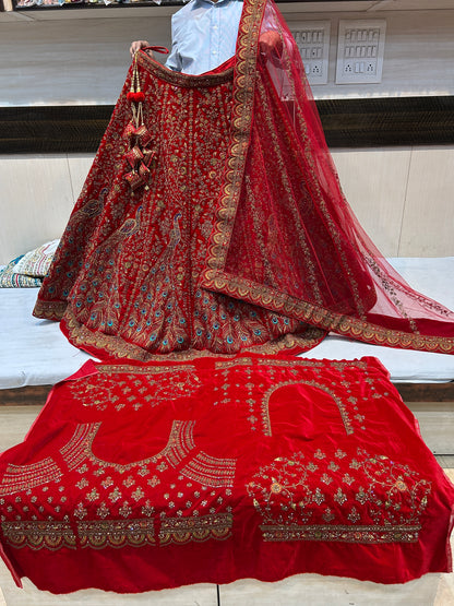 Stunning red Heavy peacock bridal lehenga