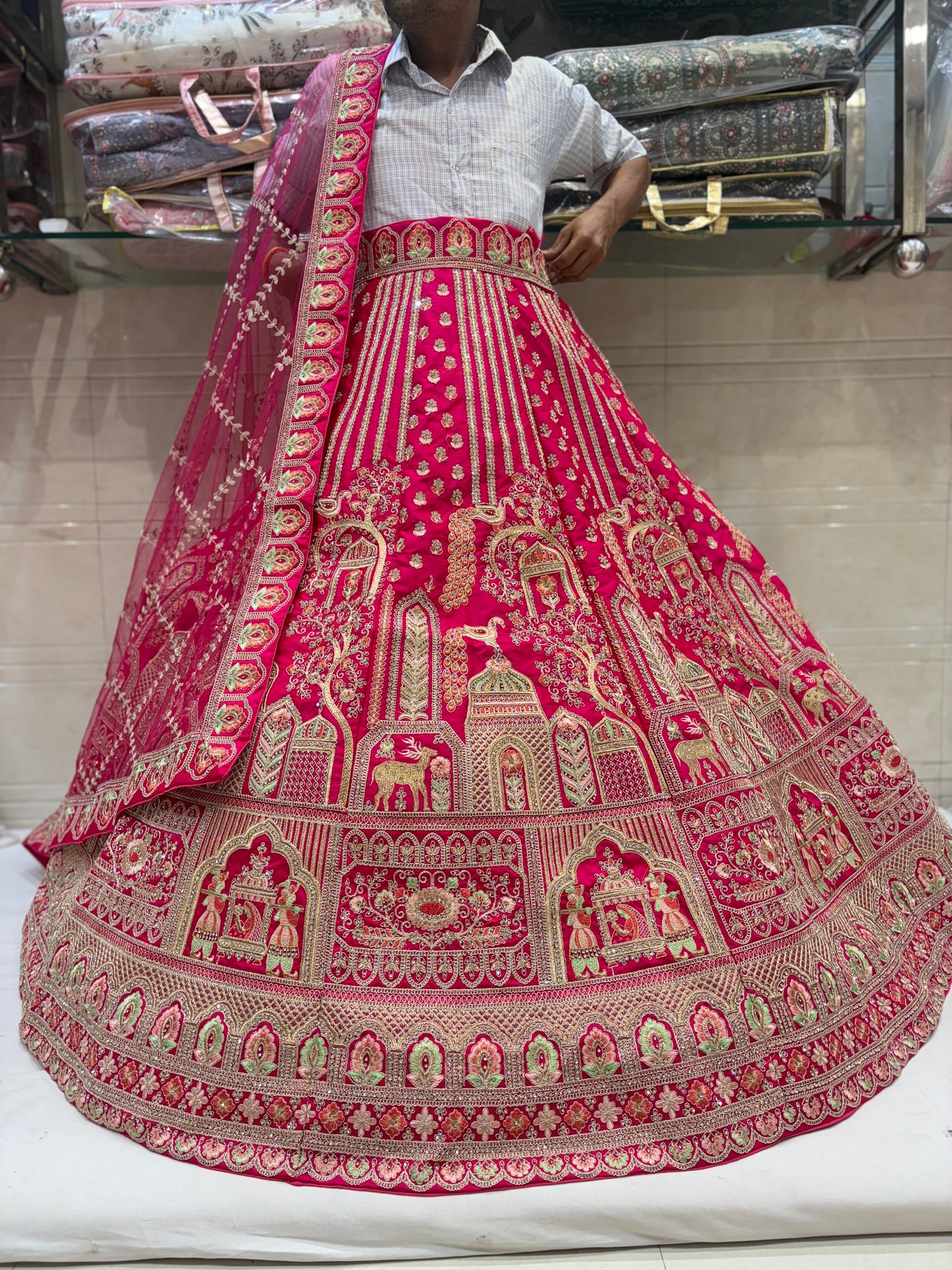 Eye catching Rani pink peacock bridal Lehenga