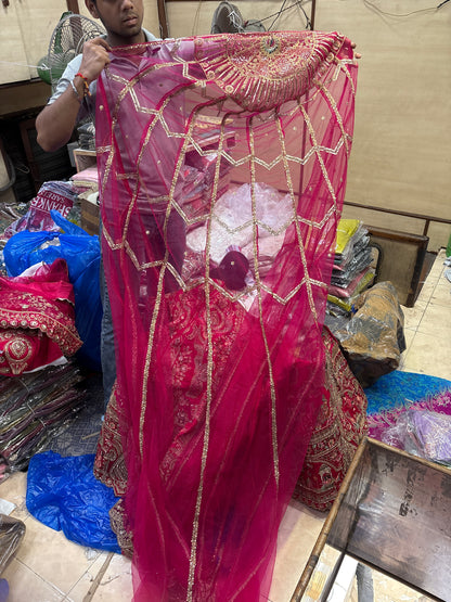 Tremendous Rani pink peacock Jaal Duptta Bridal Lehenga