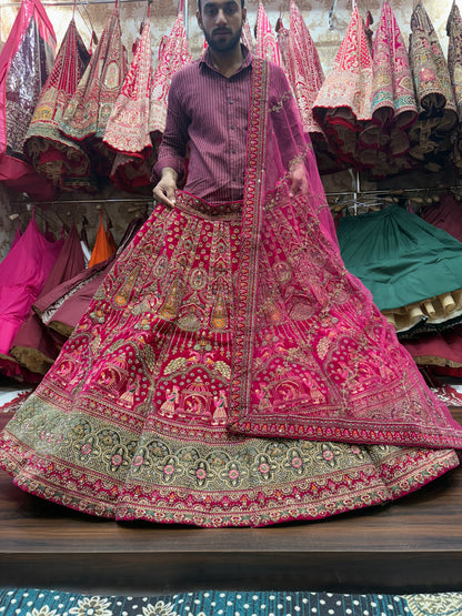 Khoobsurat pavo real granate nupcial Lehenga