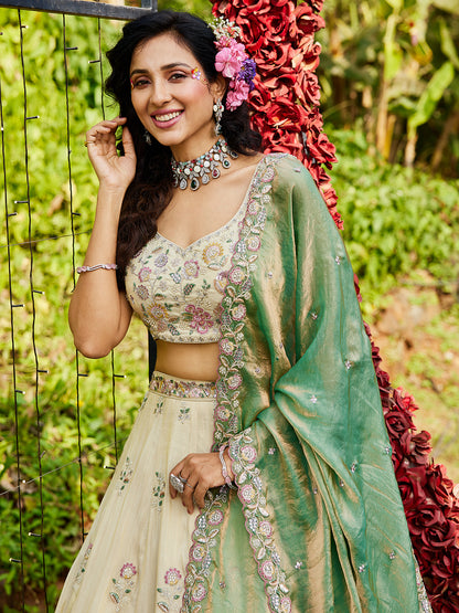 Awesome off white pista green lehenga