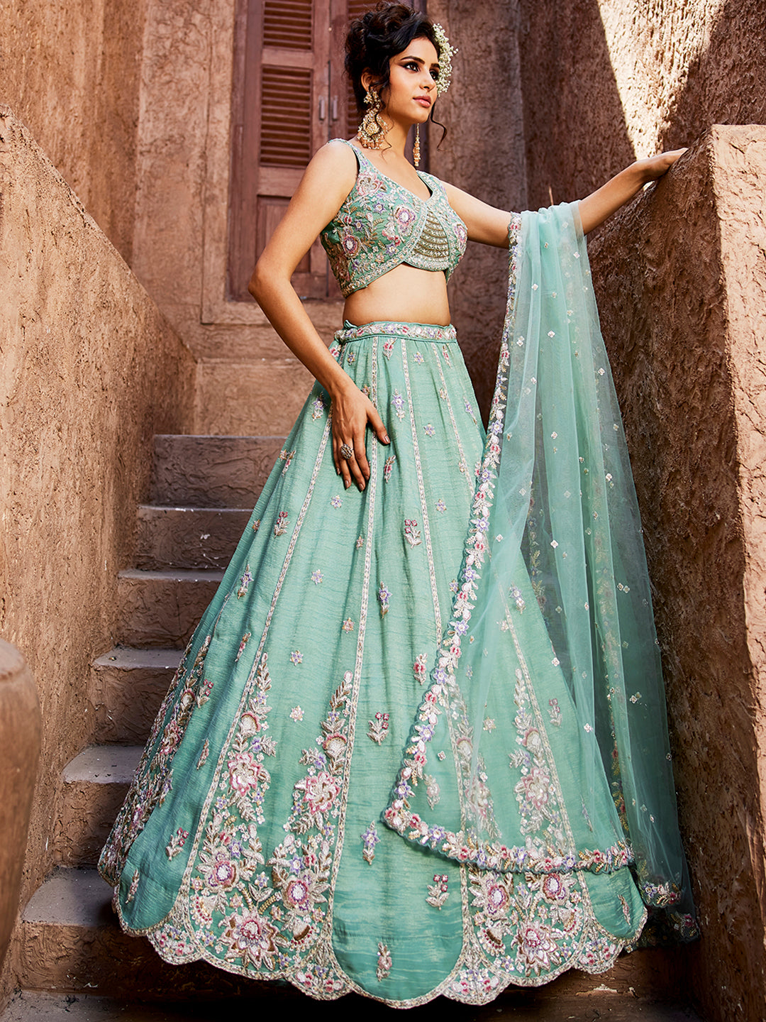 Pleasing green turquoise blue lehenga