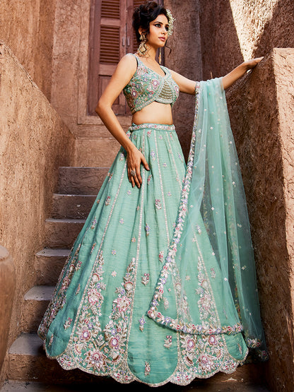 Pleasing green turquoise blue lehenga