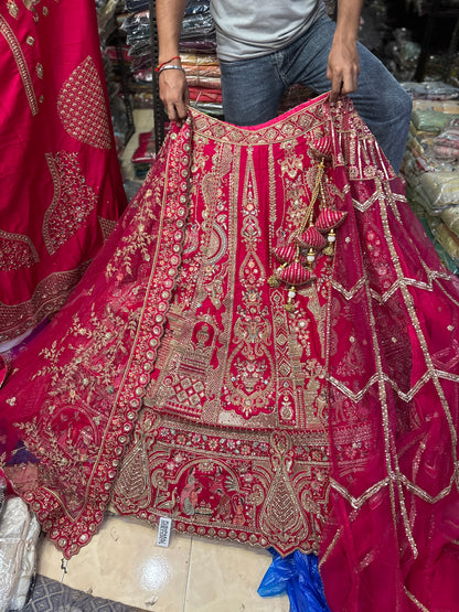 Tremendous Rani pink peacock Jaal Duptta Bridal Lehenga