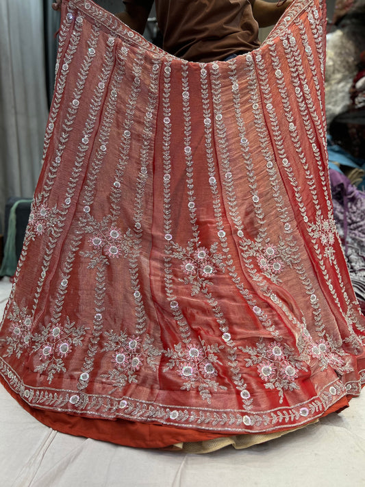Lavishing orange peach lehenga - Shopping World