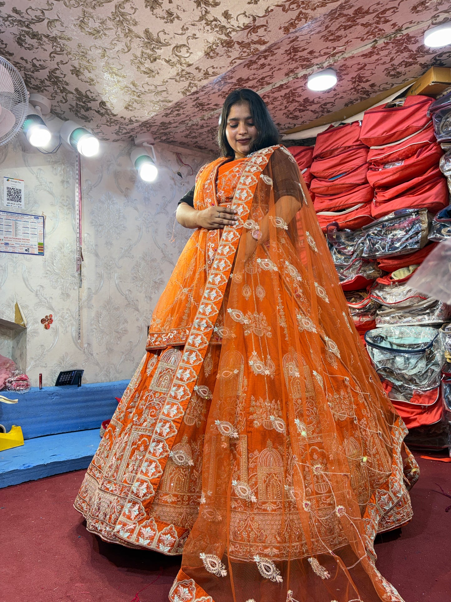 Lovely orange handwork peacock bridal Lehenga