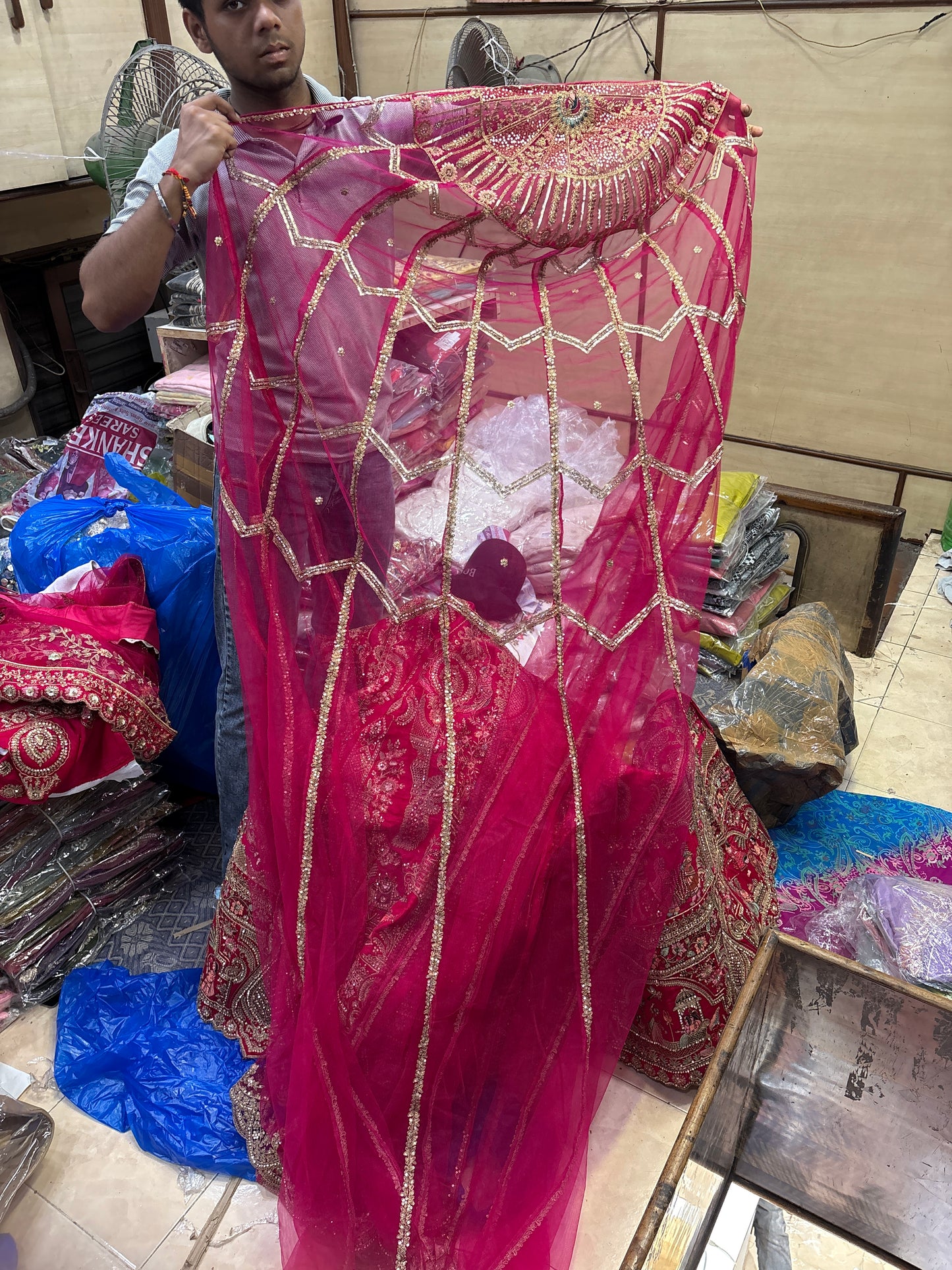 Tremendous Rani pink peacock Jaal Duptta Bridal Lehenga