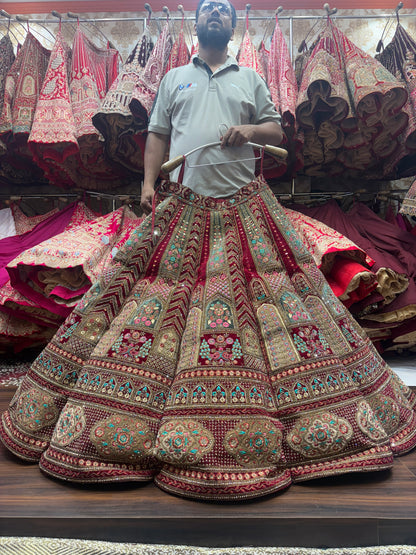 Heavy maroon peacock ball bridal Lehenga