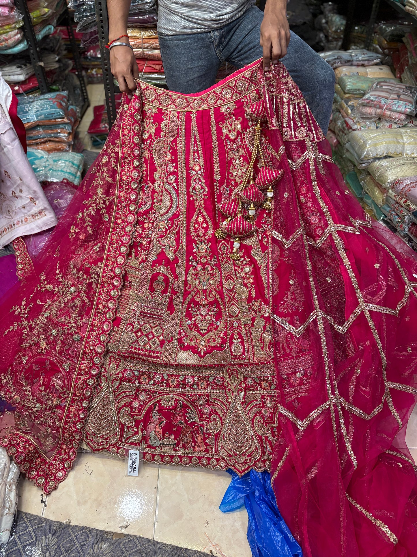 Tremendous Rani pink peacock Jaal Duptta Bridal Lehenga