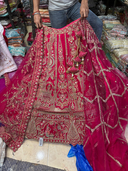 Tremendous Rani pink peacock Jaal Duptta Bridal Lehenga