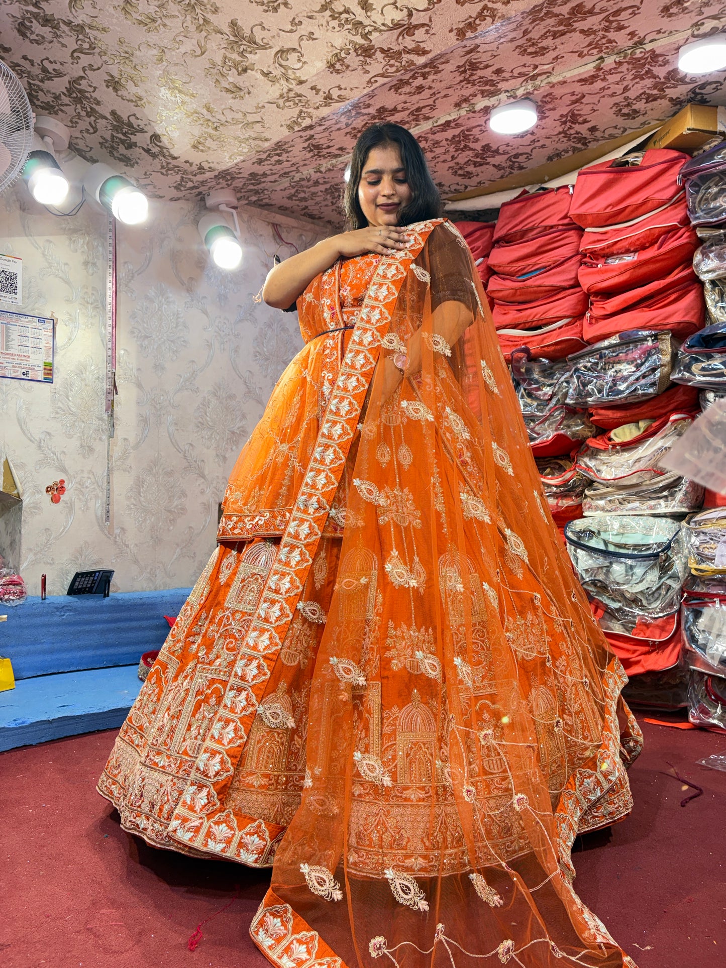 Lovely orange handwork peacock bridal Lehenga