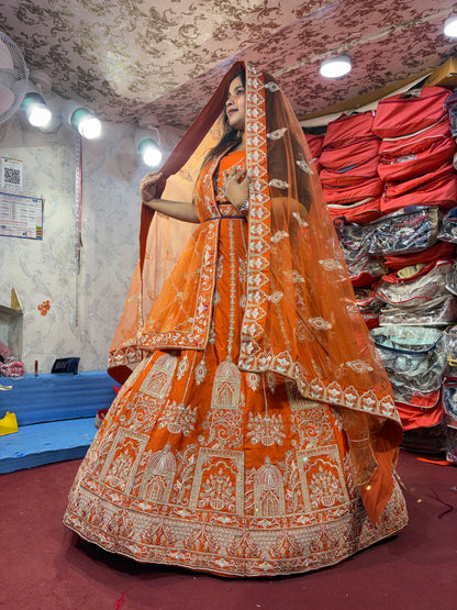 Lovely orange handwork peacock bridal Lehenga