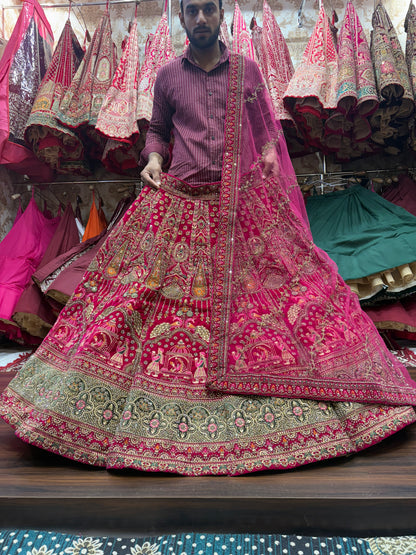 Khoobsurat pavo real granate nupcial Lehenga