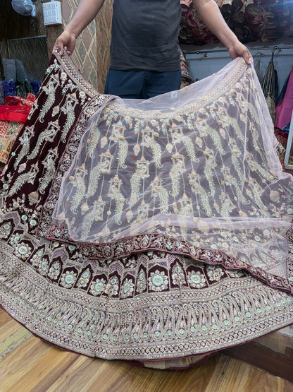 Pleasing maroon peacock bridal Lehenga