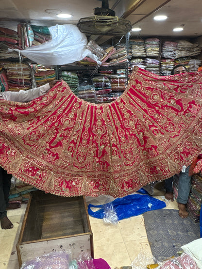 Tremendous Rani pink peacock Jaal Duptta Bridal Lehenga