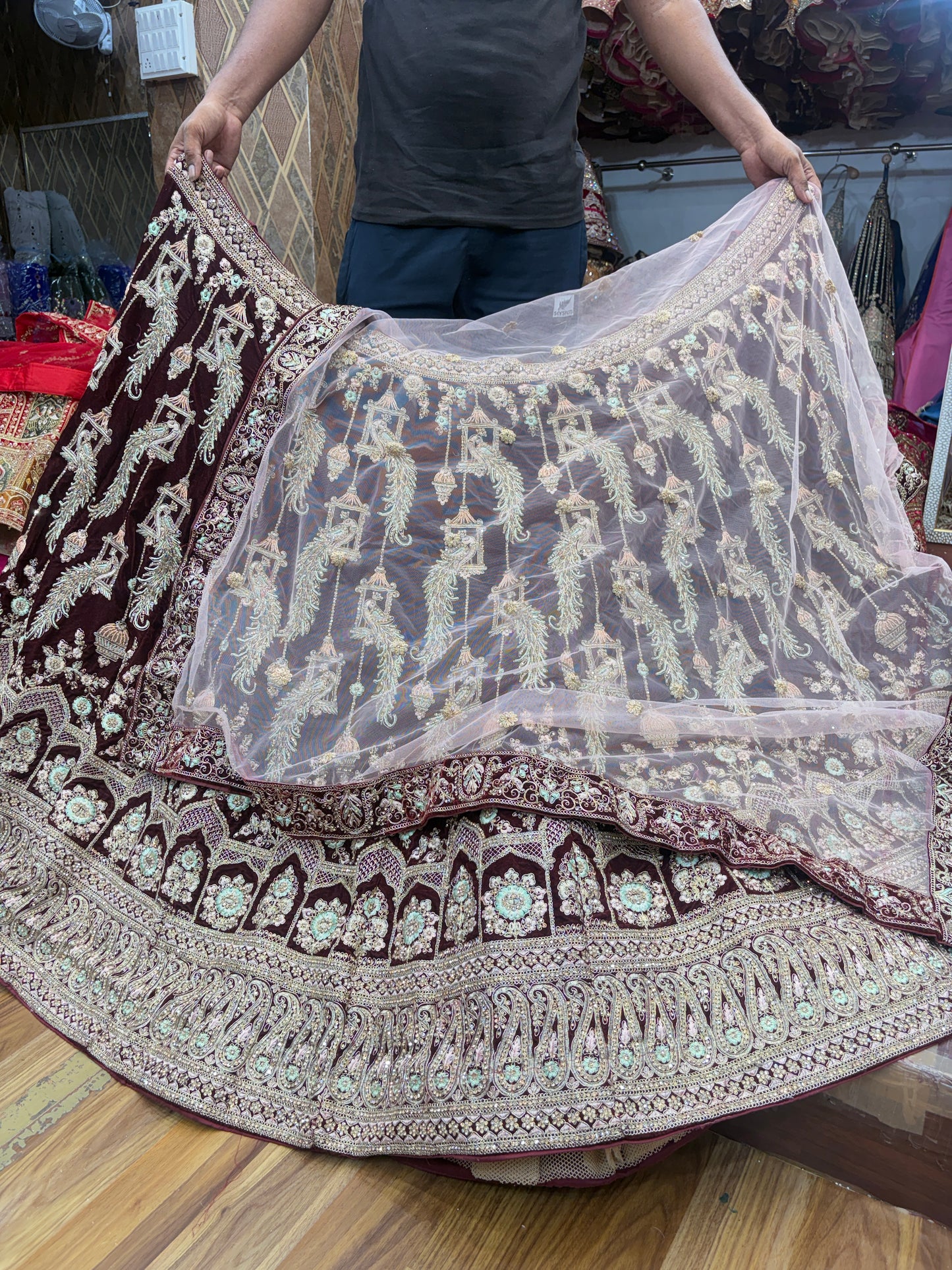 Pleasing maroon peacock bridal Lehenga