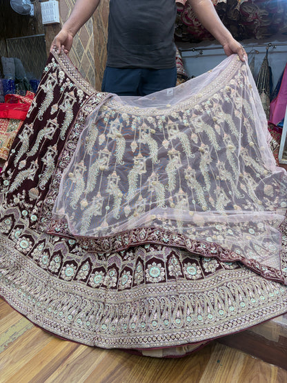 Pleasing maroon peacock bridal Lehenga