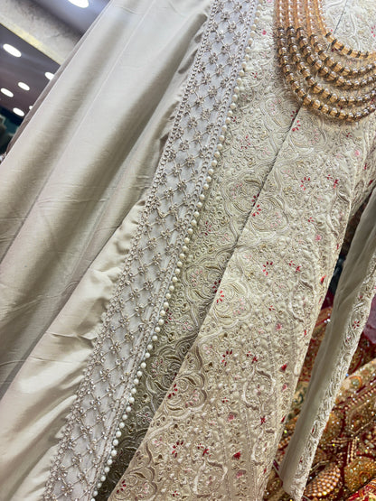 Pretty bridal peacock Lehenga sherwani combo