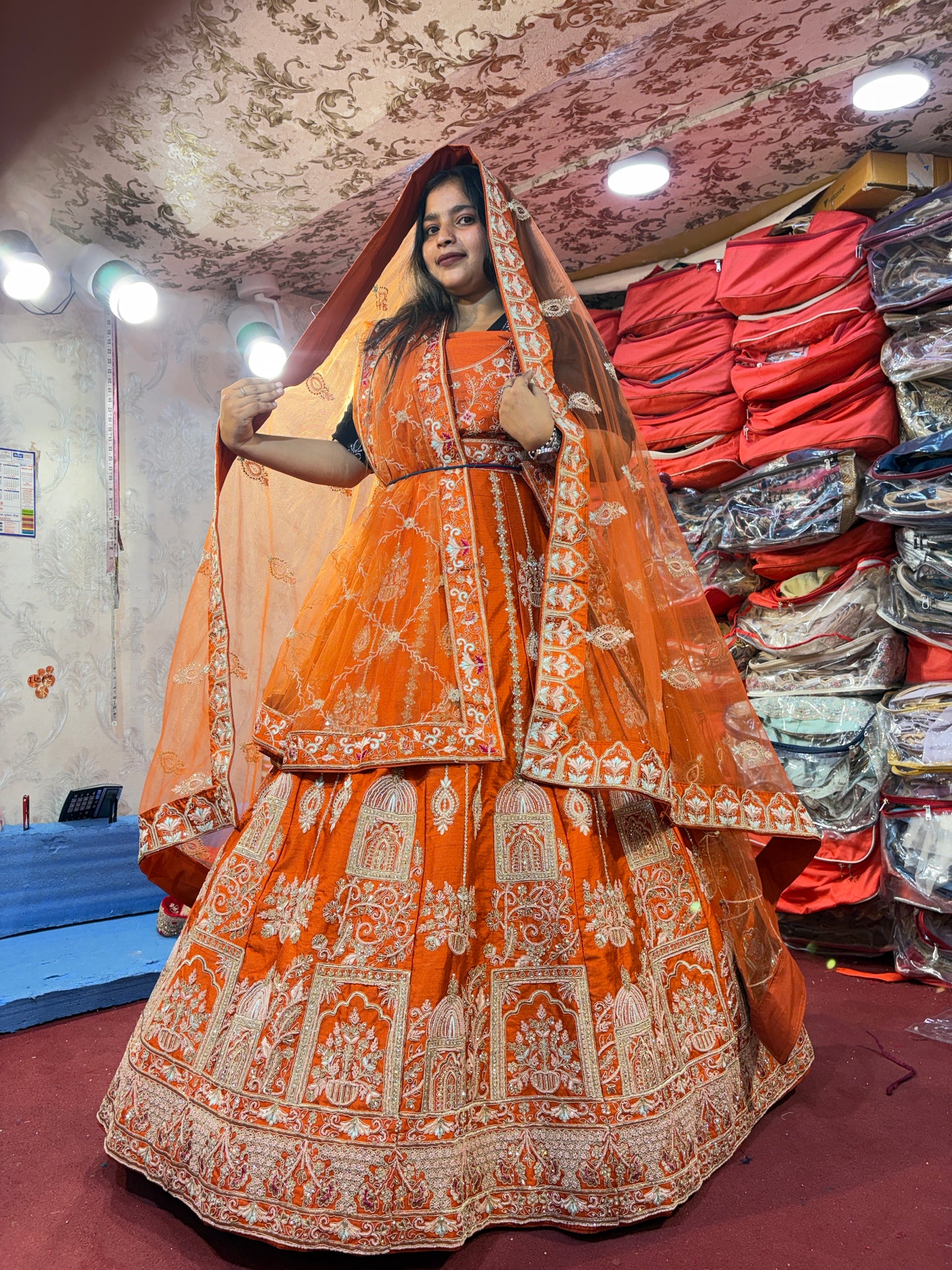 Lovely orange handwork peacock bridal Lehenga