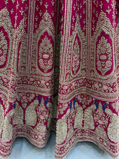 Eye catching rani pink peacock pure handwork heavy bridal Lehenga