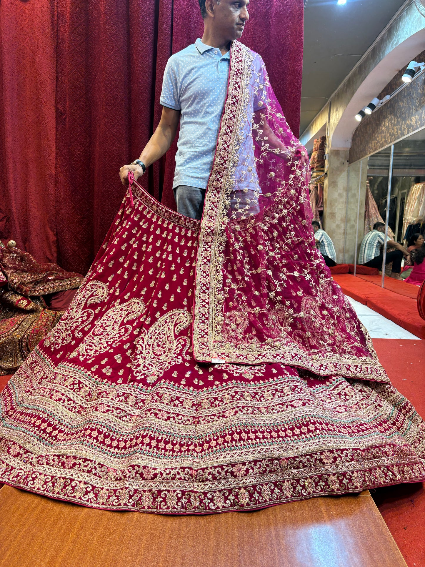 Tremendous dark rani pink peacock bridal Lehenga
