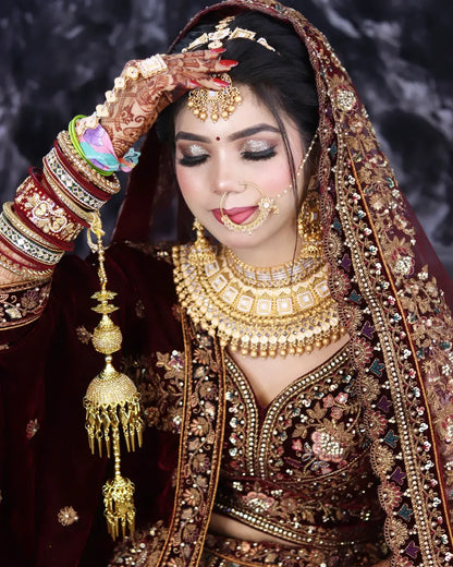 Pretty Dark maroon golden bridal lehenga ( happy customer)